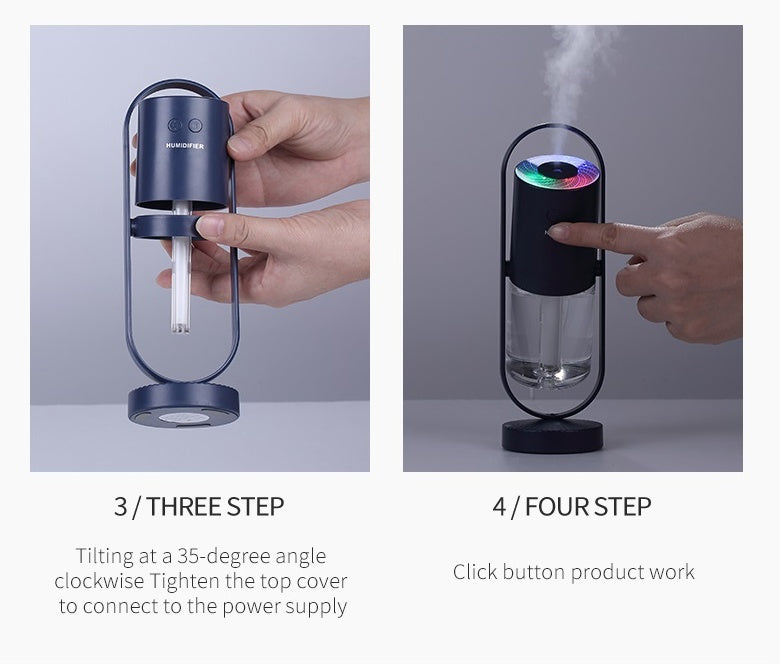 Hand holding device close-up — Close-up of USB humidifier showing compact portable design